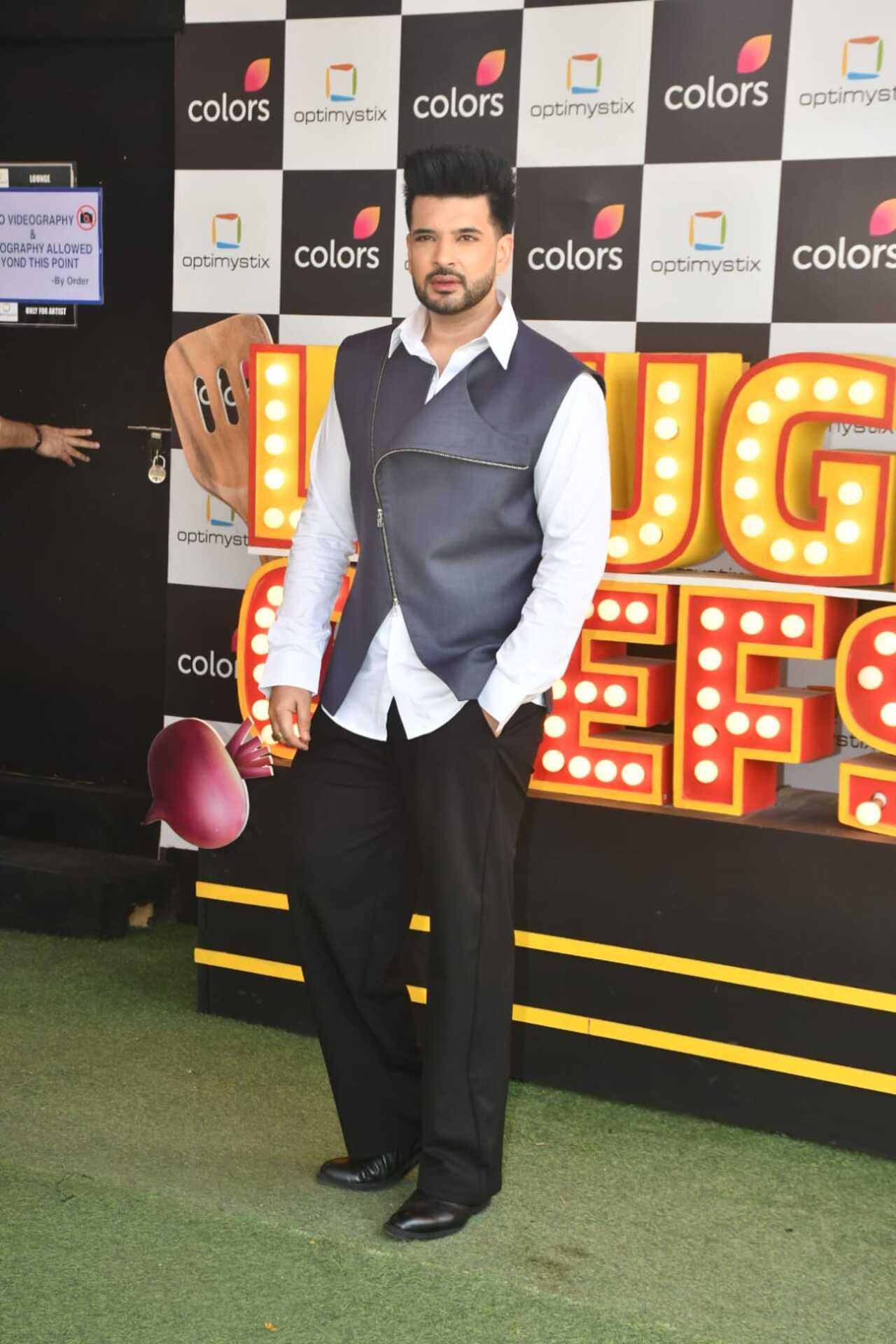Karan Kundra was seen posing for paps on the sets of Laughter Chefs on Wednesday.
